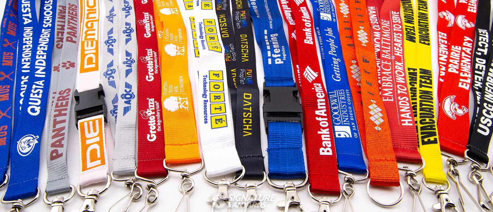 Collection of custom branded lanyards from various organizations including Panthers, Bank of America, Goodwill, and schools