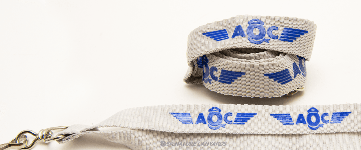 Gray nylon lanyard with blue AOC aviation wings logo and lobster claw attachment