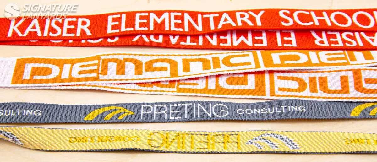 Woven lanyard with detailed sewn artwork